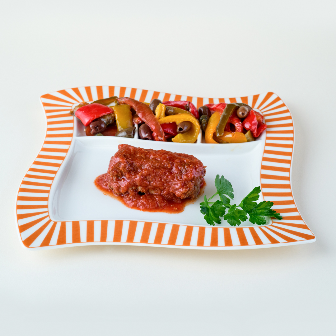 Braciola domenicale con peperoni capperi e olive